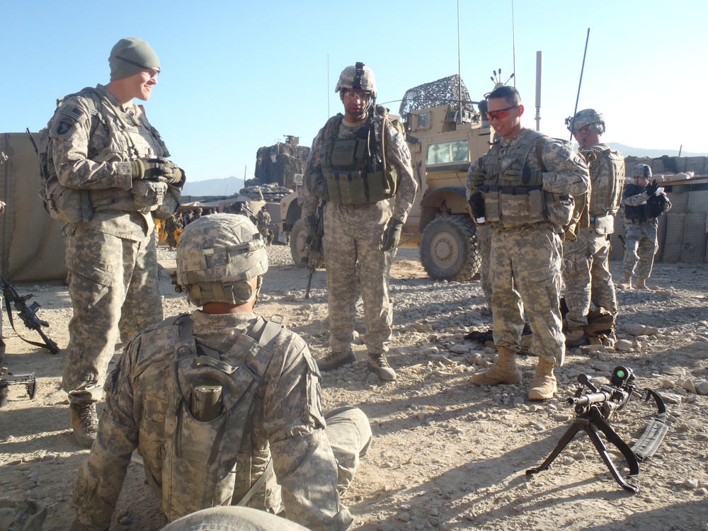 Soldiers waiting to head out on patrol in East Paktika Province
