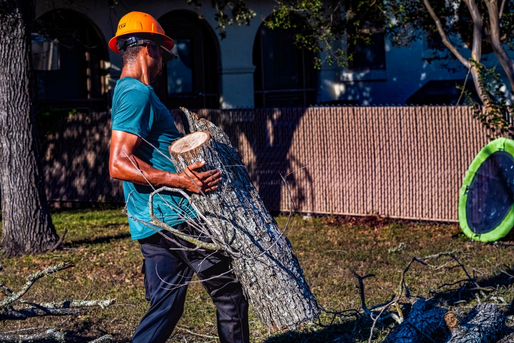 Contractors at JBSA maintain/trim trees at JBSA-Randolph