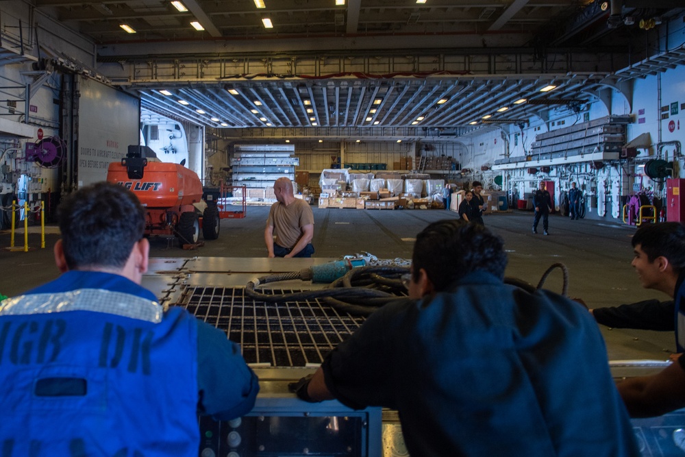 USS America (LHA 6) Moves Aviation Ground Support Equipment