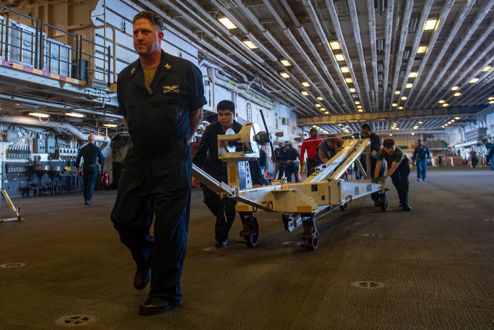 USS America (LHA 6) Moves Aviation Ground Support Equipment