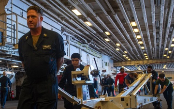 USS America (LHA 6) Moves Aviation Ground Support Equipment