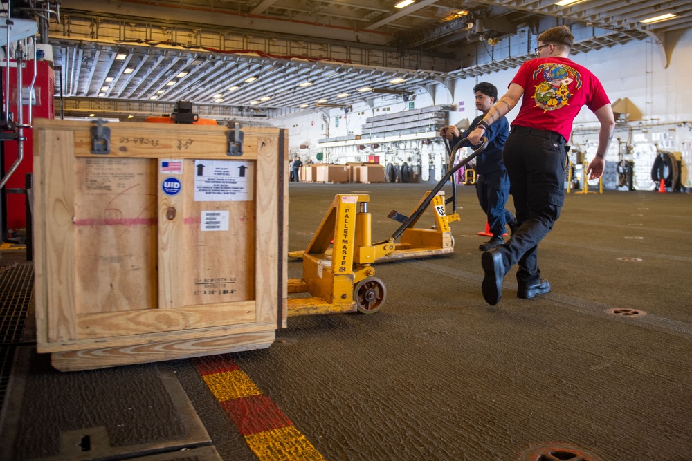 USS America (LHA 6) Moves Aviation Ground Support Equipment