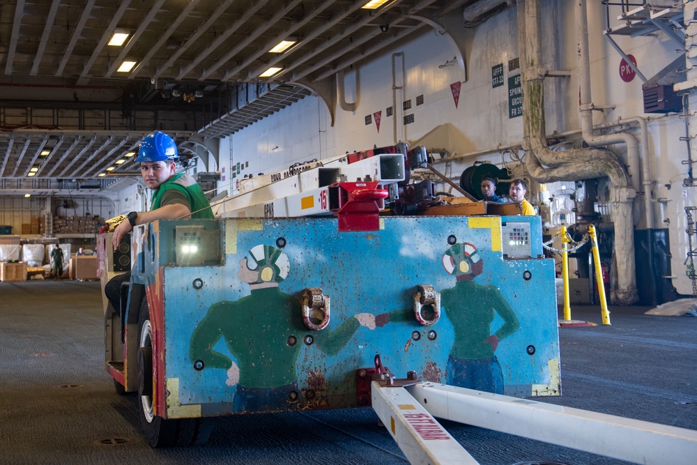 USS America (LHA 6) Moves Aviation Ground Support Equipment