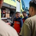 USAF and partner nation service members participate in a joint fire vehicle inspection