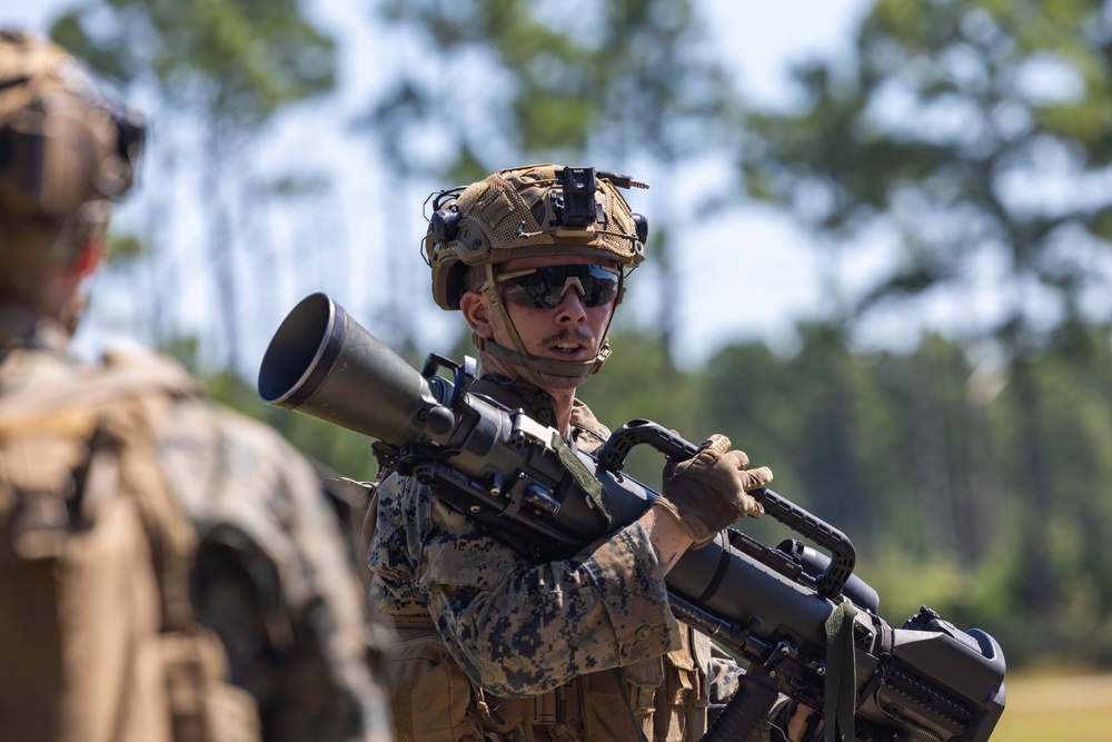 Marines with Infantry Small Unit Leadership Course participate in a combined arms live fire exercise