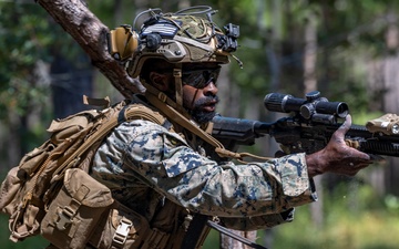 Marines with Infantry Small Unit Leadership Course participate in a combined arms live fire exercise