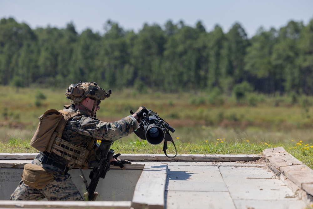 Marines with Infantry Small Unit Leadership Course participate in a combined arms live fire exercise