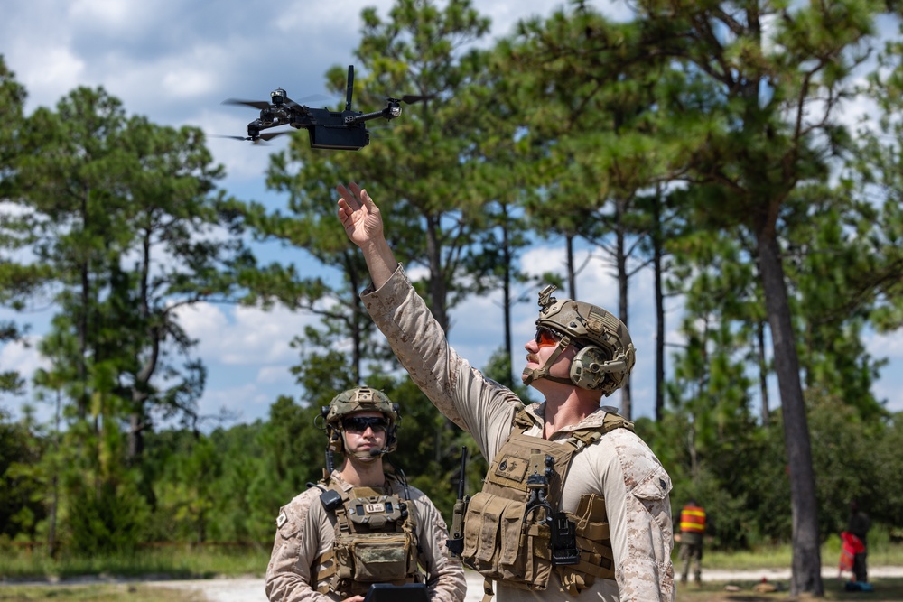 Marines with Infantry Small Unit Leadership Course participate in a combined arms live fire exercise