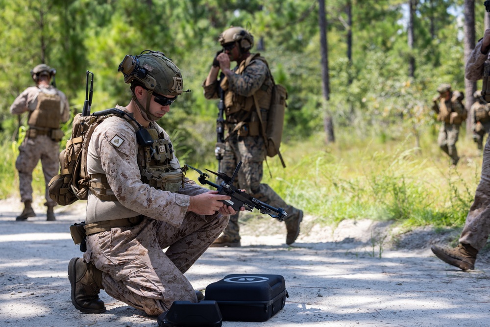 Marines with Infantry Small Unit Leadership Course participate in a combined arms live fire exercise