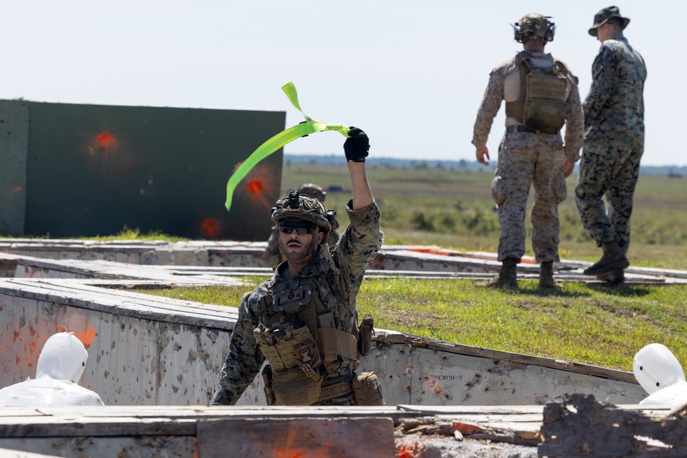 Marines with Infantry Small Unit Leadership Course participate in a combined arms live fire exercise