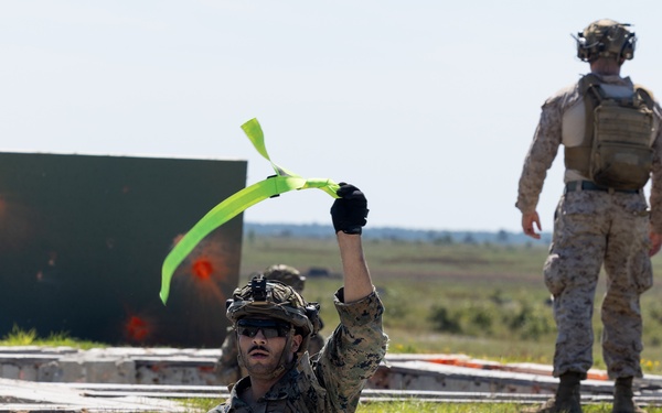 Marines with Infantry Small Unit Leadership Course participate in a combined arms live fire exercise
