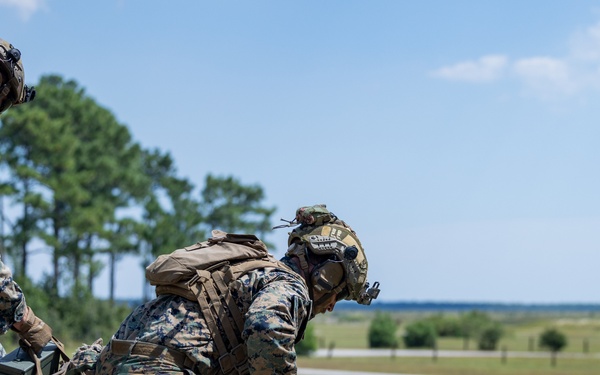 Marines with Infantry Small Unit Leadership Course participate in a combined arms live fire exercise
