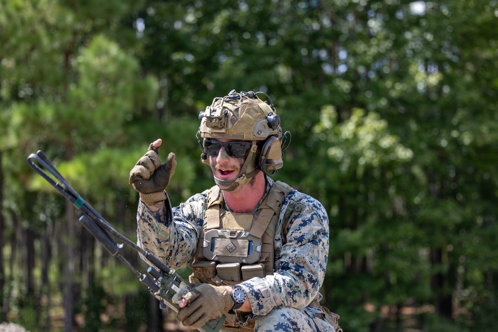 Marines with Infantry Small Unit Leadership Course participate in a combined arms live fire exercise