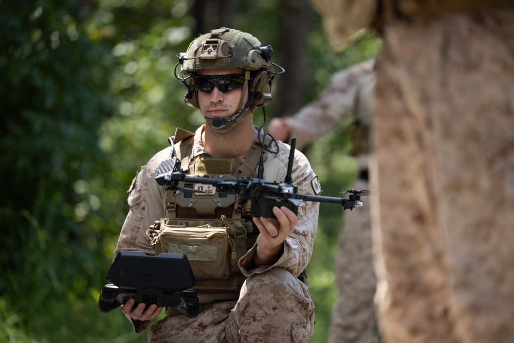 Marines with Infantry Small Unit Leadership Course participate in a combined arms live fire exercise