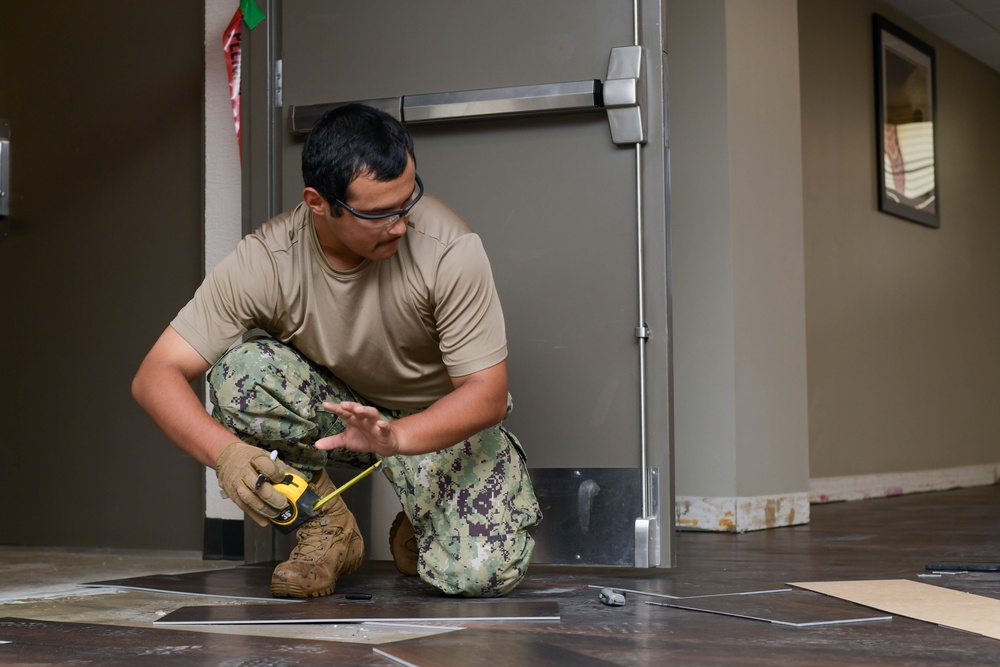 NMCB 11 Seabees refloor Pascagoula Barracks NMCB 11 Seabees refloor Pascagoula Barracks