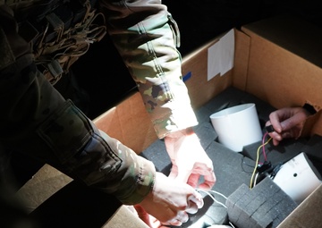 Interagency Explosive Ordnance Disposal techs dispose of aerial bombs on Fort Riley