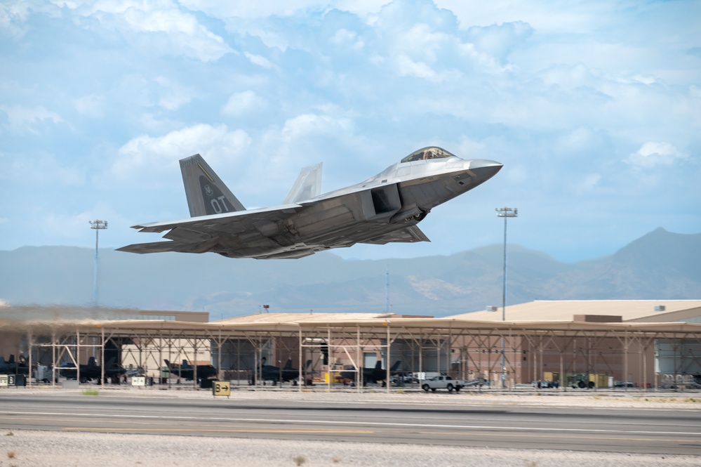 Nellis fighter aircraft conduct training missions