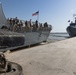 USS Truxton Pulls into Port at the Ras Al Tin Naval Base