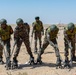 Indians demonstrate their explosive hazard detection equipment to U.S. Marines and multi-national partners