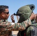 Indians demonstrate their explosive hazard detection equipment to U.S. Marines and multi-national partners