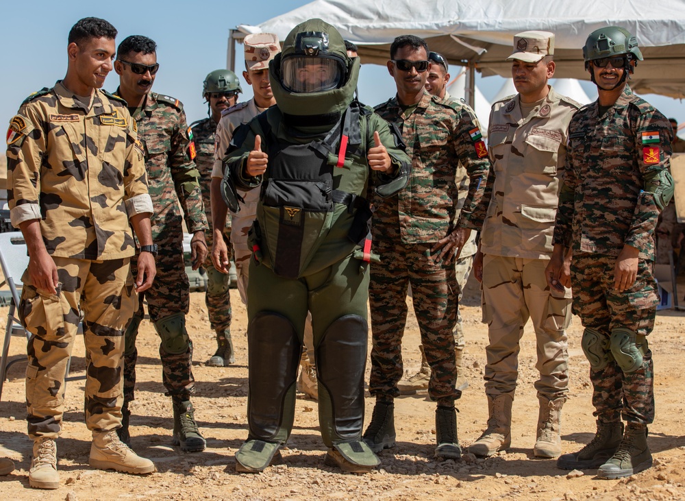 Indians demonstrate their explosive hazard detection equipment to U.S. Marines and multi-national partners