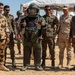 Indians demonstrate their explosive hazard detection equipment to U.S. Marines and multi-national partners