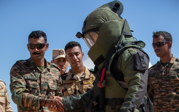 Indians demonstrate their explosive hazard detection equipment to U.S. Marines and multi-national partners