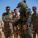 Indians demonstrate their explosive hazard detection equipment to U.S. Marines and multi-national partners
