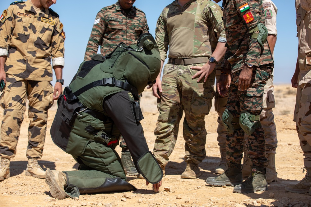 Indians demonstrate their explosive hazard detection equipment to U.S. Marines and multi-national partners