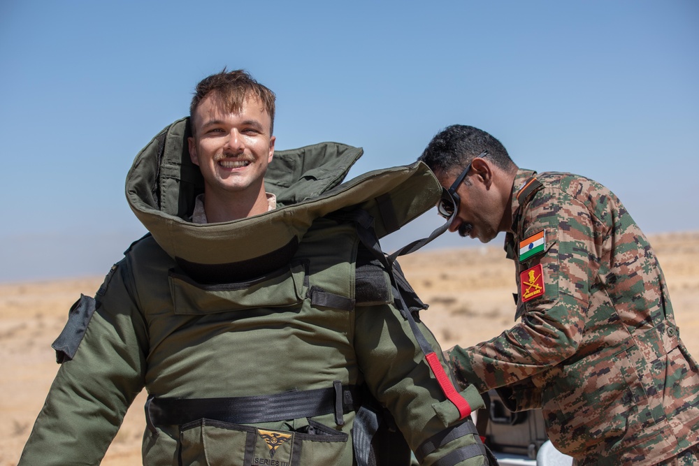 Indians demonstrate their explosive hazard detection equipment to U.S. Marines and multi-national partners