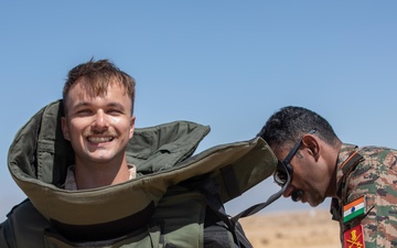Indians demonstrate their explosive hazard detection equipment to U.S. Marines and multi-national partners