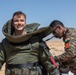 Indians demonstrate their explosive hazard detection equipment to U.S. Marines and multi-national partners