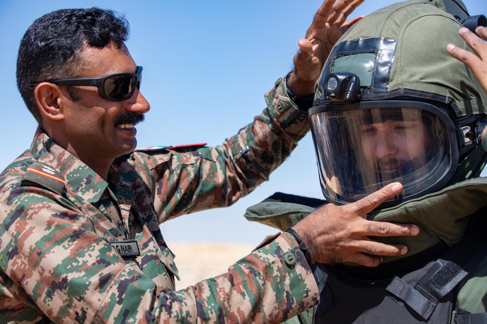 Indians demonstrate their explosive hazard detection equipment to U.S. Marines and multi-national partners