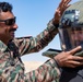 Indians demonstrate their explosive hazard detection equipment to U.S. Marines and multi-national partners