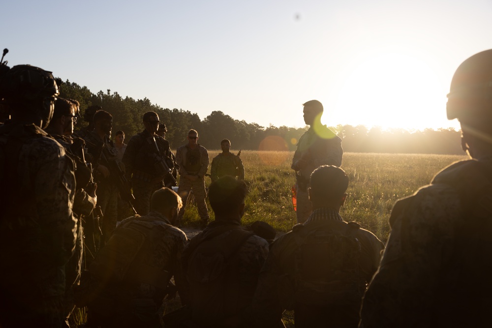 Marines with Advanced Infantry Training Company perform a combined arms live fire range