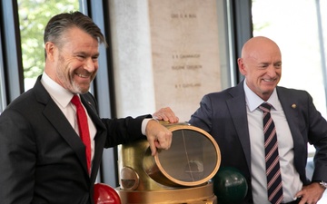 Senators Accept Navy League Sea Services Award