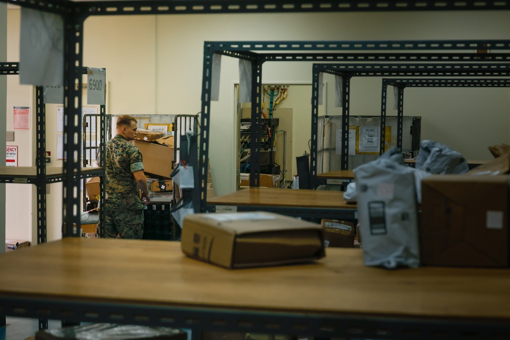 Camp Courtney Postal Clerks Sort Through Mail Delivery