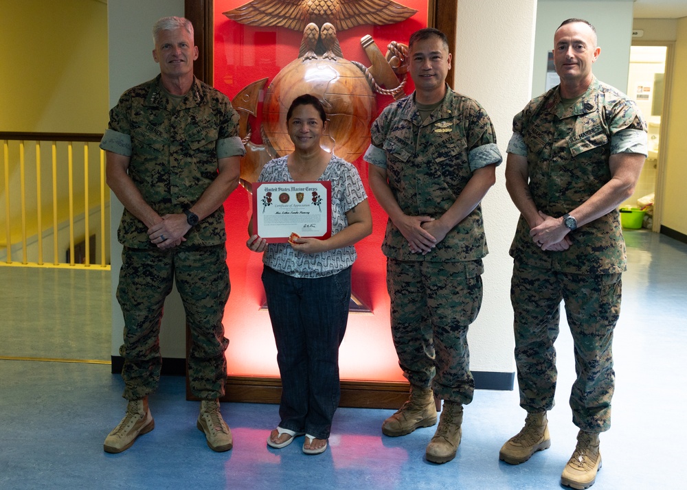OKINAWA, JAPAN – U.S. Navy Spouse of 30 years receives appreciation award