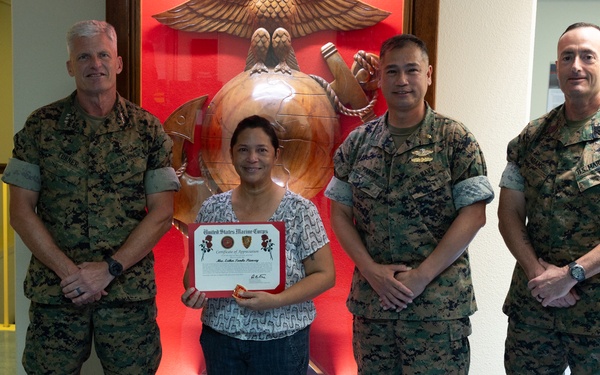 OKINAWA, JAPAN – U.S. Navy Spouse of 30 years receives appreciation award