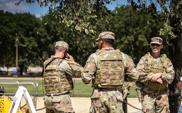 West Virginia National Guard soldiers assigned to Joint Task Force - District of Columbia assist local woman in distress