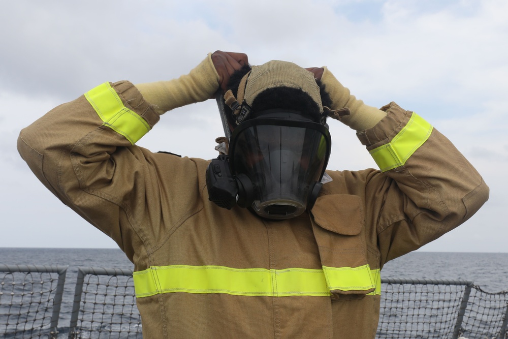 Sailors aboard the USS John Finn conduct a general quarters drill in the Java Sea during Super Garuda Shield