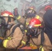 Sailors aboard the USS John Finn conduct a general quarters drill in the Java Sea during Super Garuda Shield