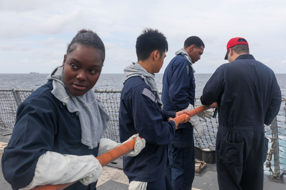 Sailors aboard the USS John Finn conduct a general quarters drill in the Java Sea during Super Garuda Shield