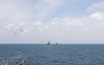 The USS John Finn sails in formation with KRI John Lie, KRI Makassar, and JS Osumi during Super Garuda Shield in the Java Sea
