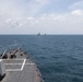 The USS John Finn sails in formation with KRI John Lie, KRI Makassar, and JS Osumi during Super Garuda Shield in the Java Sea