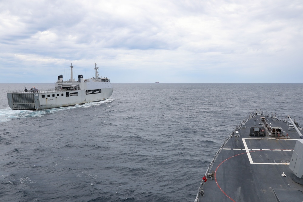 Sailors aboard the USS John Finn conduct a replenishment-at-sea approach exercise during Super Garuda Shield in the Java Sea