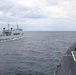 Sailors aboard the USS John Finn conduct a replenishment-at-sea approach exercise during Super Garuda Shield in the Java Sea