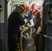 Sailors aboard the USS John Finn conduct a damage control exercise in the Java Sea