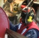 Sailors aboard the USS John Finn conduct a crash and salvage drill in the Java Sea