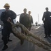 Sailors aboard the USS John Finn conduct a sea and anchor detail in Jakarta, Indonesia